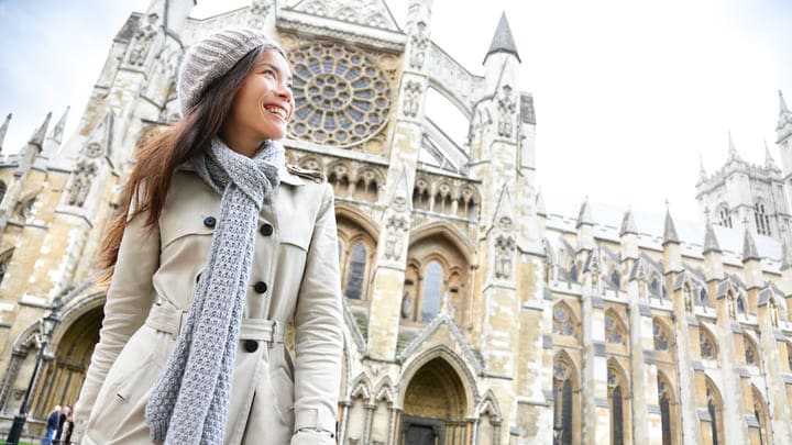Tourist in front of Westminster Abbey